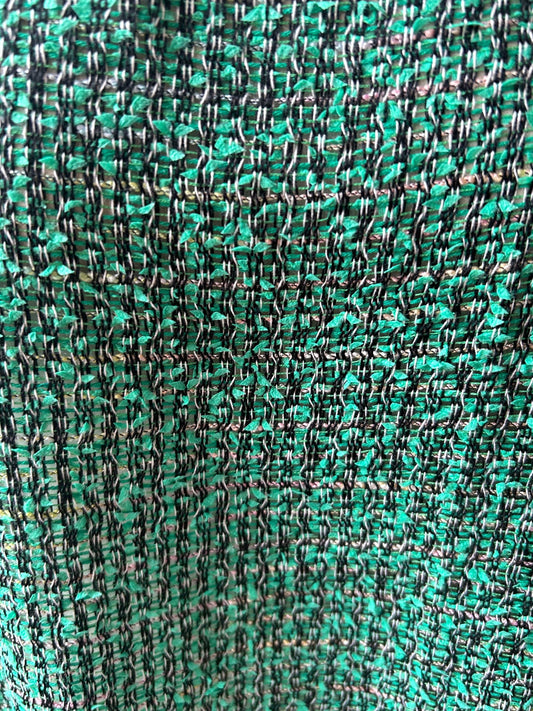 Robe sans manches à volant en tweed vert, noir et blanc fabriqué en France