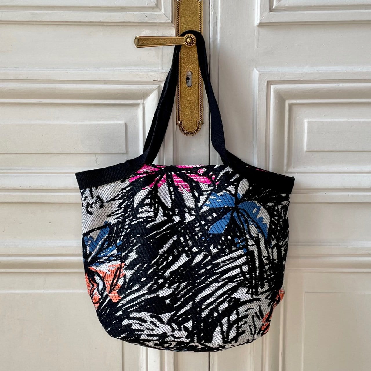 Sac François en tweed noir, blanc, rose, orange et bleu klein tissé et fabriqué en France