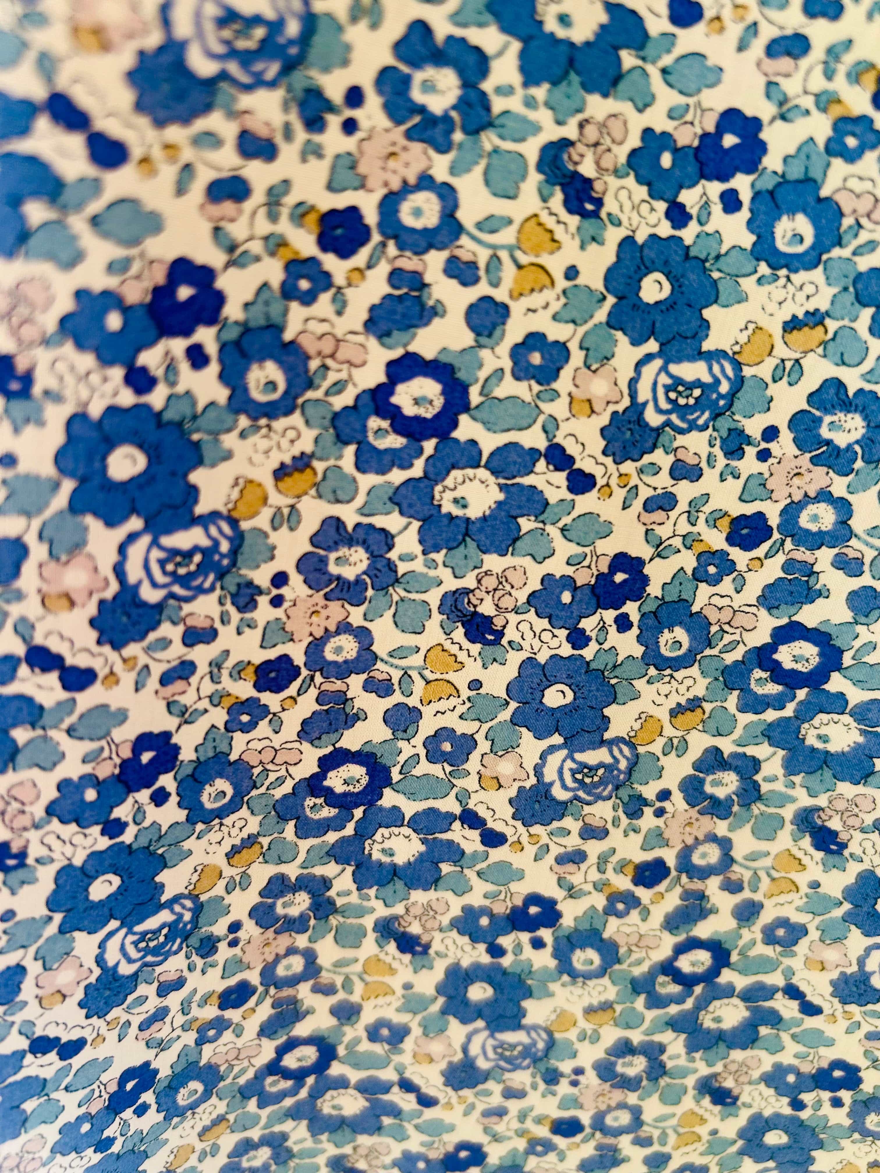 Robe sans manches boutonnée en V fabriquée en France