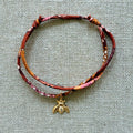 Bracelet Evesome x Le Petit Lien de Paris en Liberty de coton et acier inoxydable doré