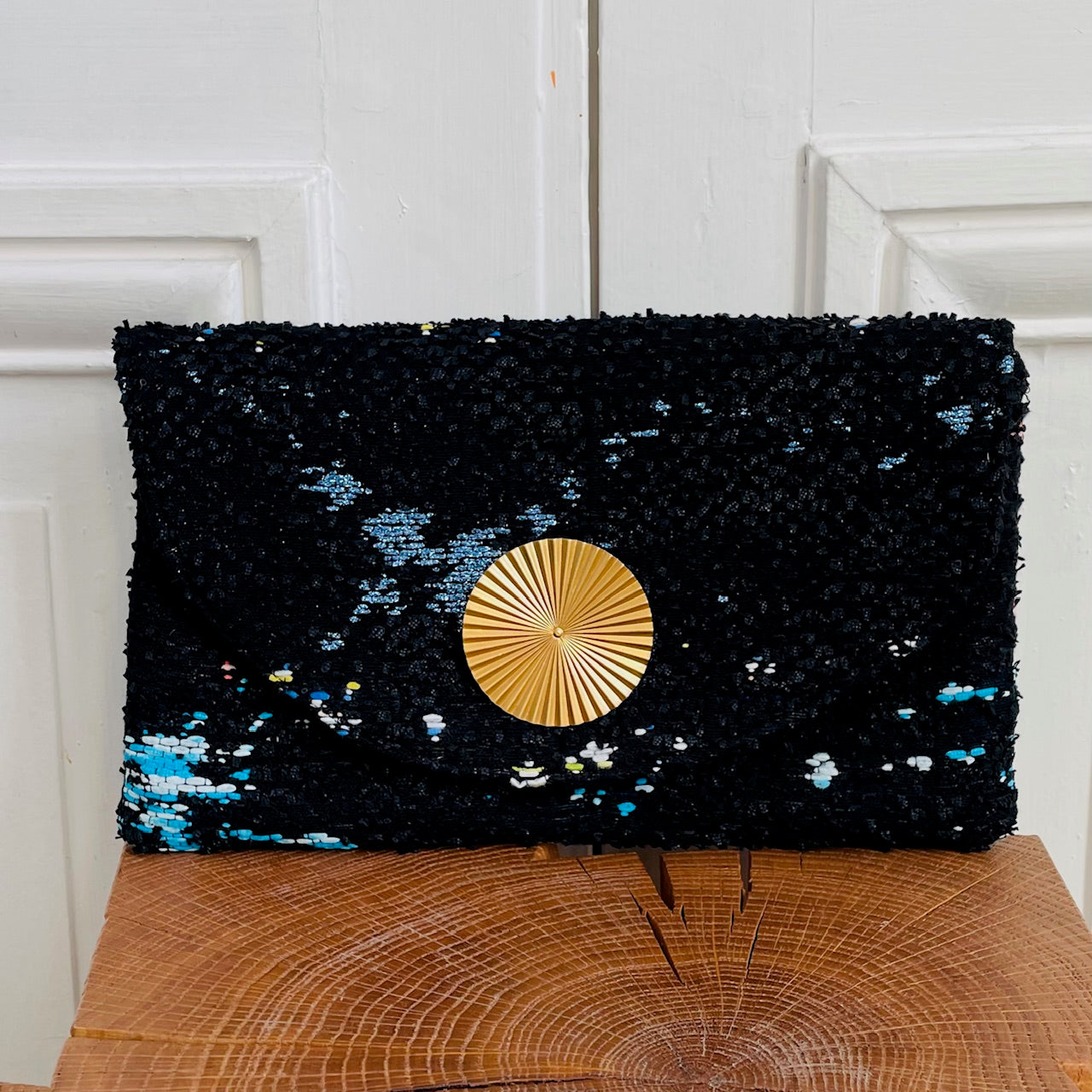 Pochette Sylvestre en tweed noir, bleu, blanc et jaune fabriqué en France