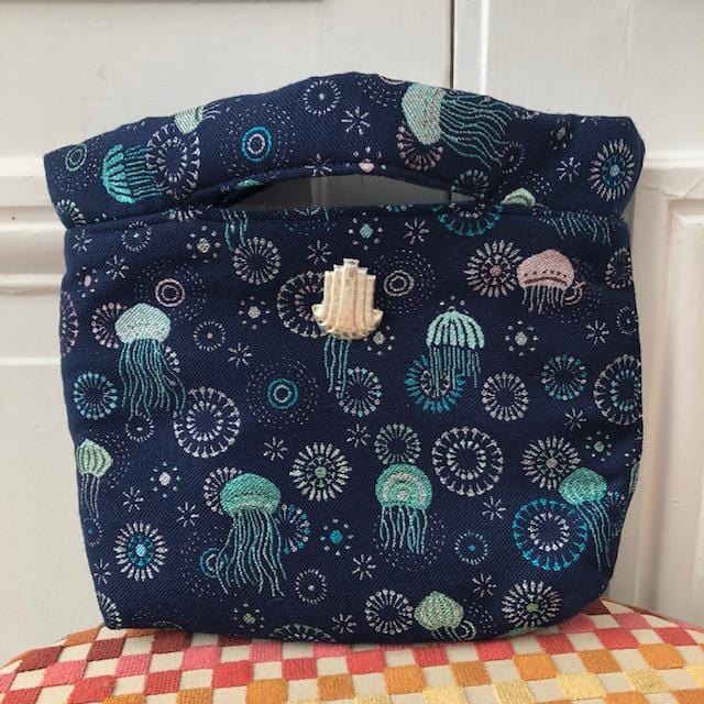 Pochette Agathe en tweed bleu marine, turquoise et argenté tissé et fabriquée en France