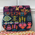 Pochette Irène en tweed bleu marine, orange, rose, turquoise et jaune tissé et fabriquée en France