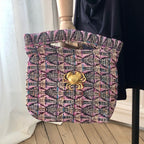 Pochette Agathe en tweed lilas, rose et marine tissé et fabriquée en France