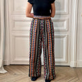 Pantalon en tweed noir, violet, orange et or fabriqué en France