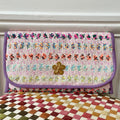 Pochette Alexandre en tweed rose tendre, lilas, jaune moutarde, orange, vert amande et rose fluo tissé et fabriquée en France