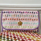 Pochette Alexandre en tweed rose tendre, lilas, jaune moutarde, orange, vert amande et rose fluo tissé et fabriquée en France