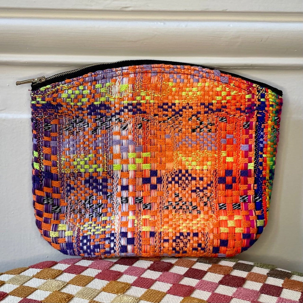 Pochette Etienne en tweed orange, jaune, violet et lilas tissé et fabriquée en France