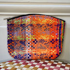 Pochette Etienne en tweed orange, jaune, violet et lilas tissé et fabriquée en France