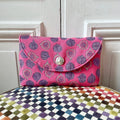 Pochette Sylvestre en tweed figues rose, lilas et argenté tissé et fabriquée en France