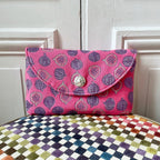 Pochette Sylvestre en tweed figues rose, lilas et argenté tissé et fabriquée en France